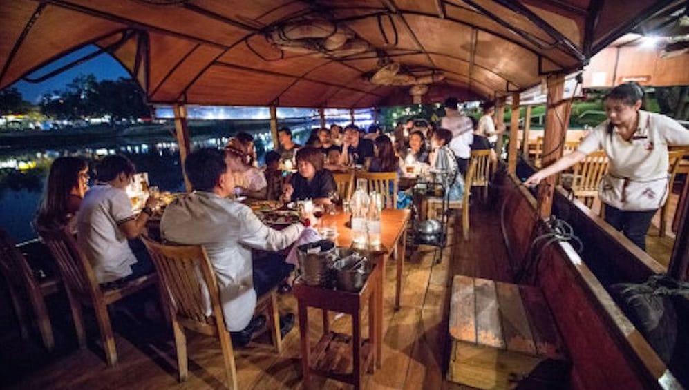 Guests enjoying a delicious Thai Set Menu on the Ping River Cruise