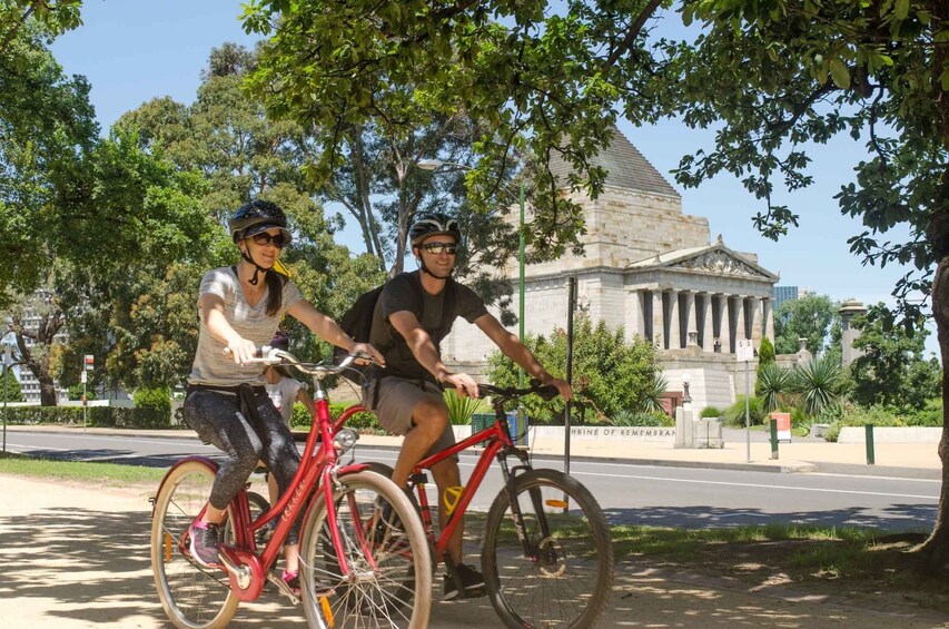 Show item 3 of 8. Couple enjoying a biking tour in Melbourne