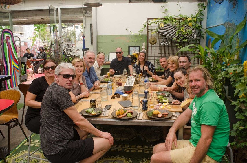 Show item 2 of 8. Tour group enjoying lunch in the bohemian suburb of Fitzroy