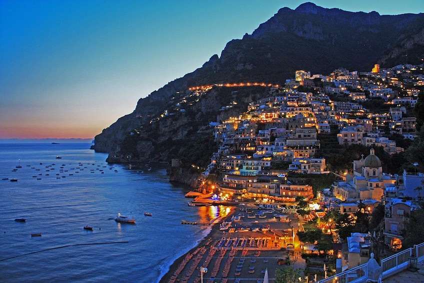 Show item 1 of 10. Coast of Positano, Italy at sunset
