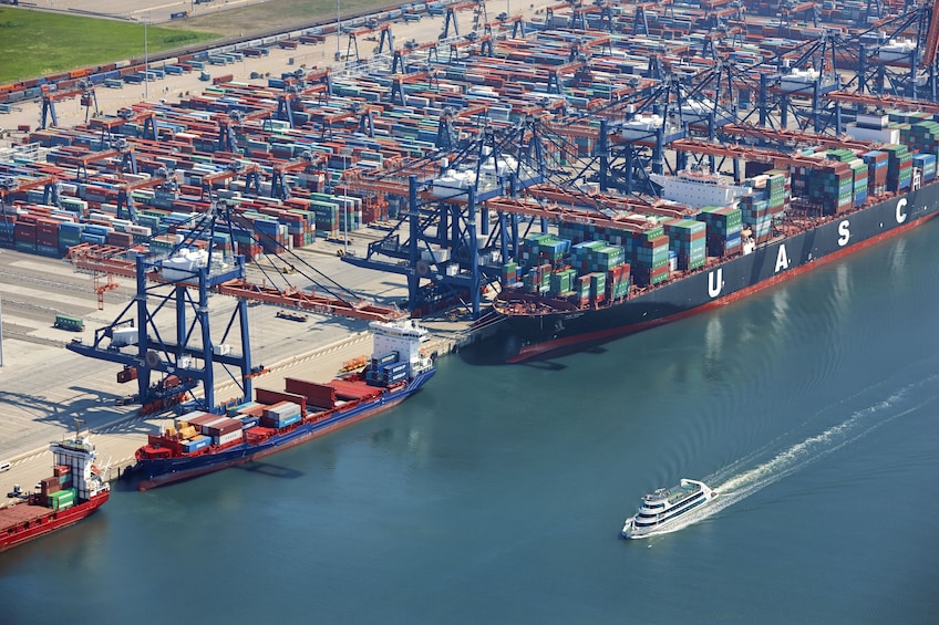 Aerial view of a steamship cruising along Rotterdam Harbour 