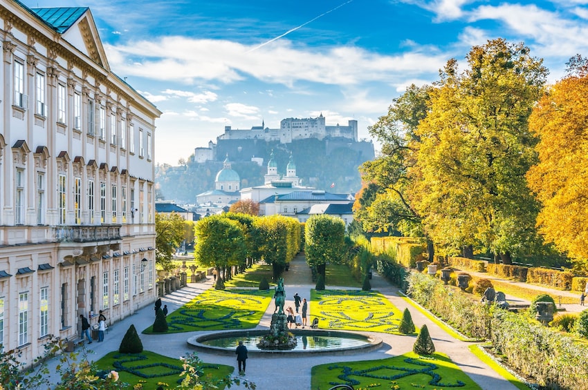 Famous Mirabell Gardens with Fortress Hohensalzburg in the background