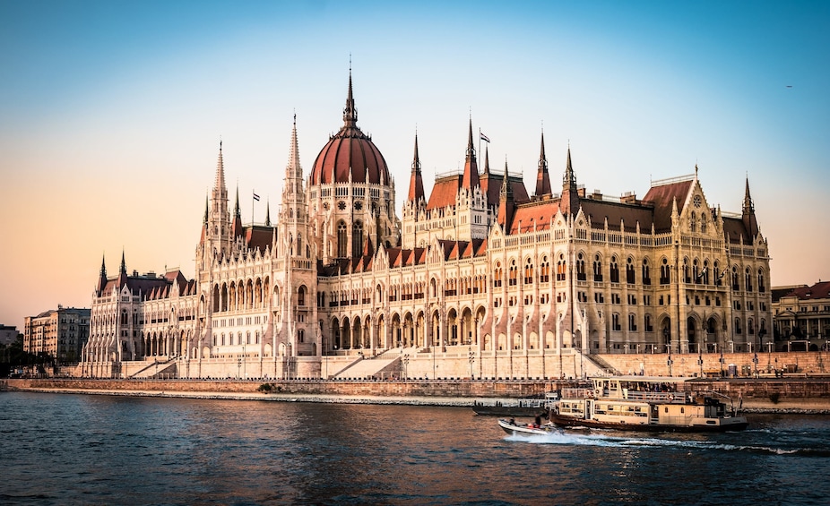 National Hungarian Parliament and Danube in Budapest at sunset