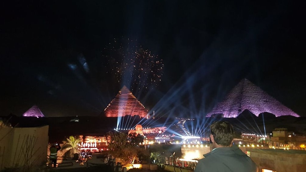Pyramids of Giza lit up at night during Sound and Light show