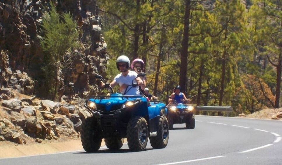 Group touring Arona by quad bikes