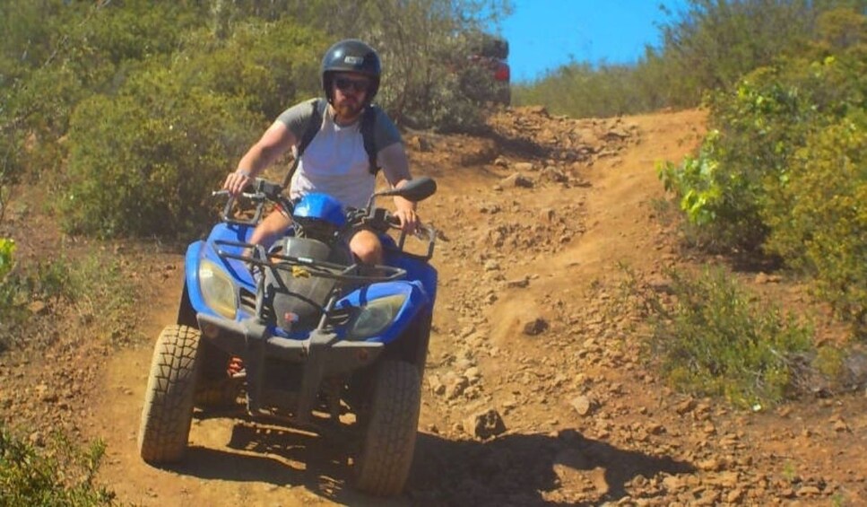 Man quad biking in Arona