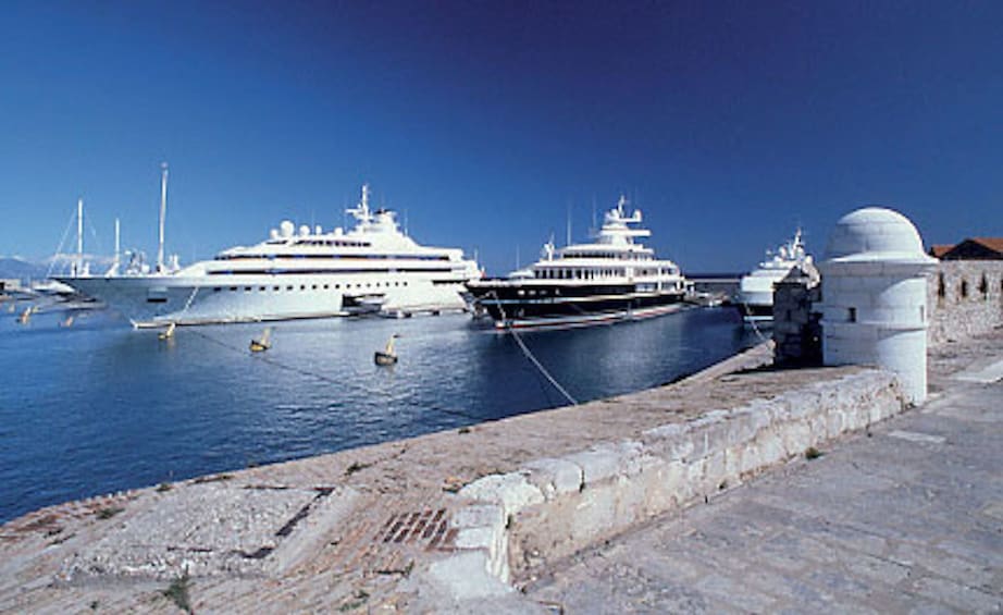 Two yachts moored at the Port of Antibes