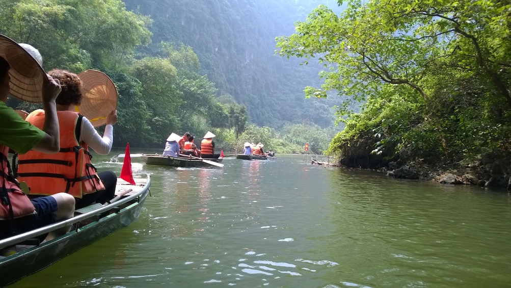 Sampan boats on a river in Trang An