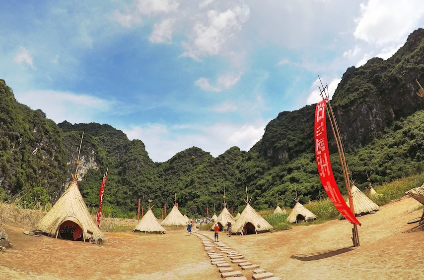 Straw tents in a field in Vietnam