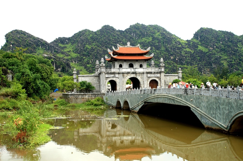 Bridge over a river and gate in Hoa Lu Ancient Capital