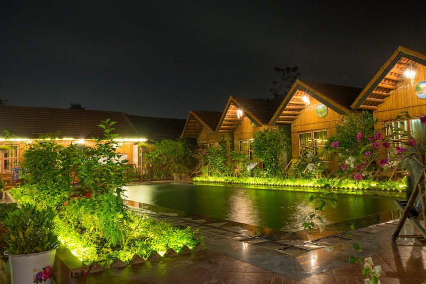 Tam Coc Bungalows with swimming pool at night