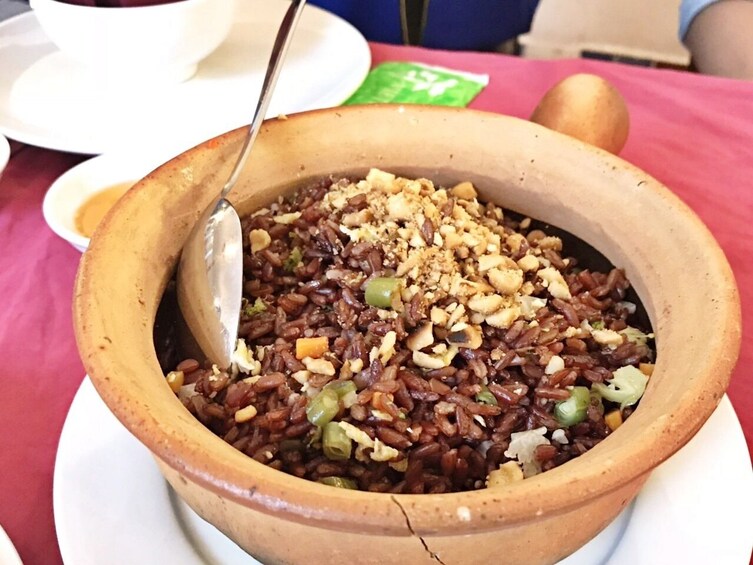 Brown rice in a clay pot in Ho Chi Minh City