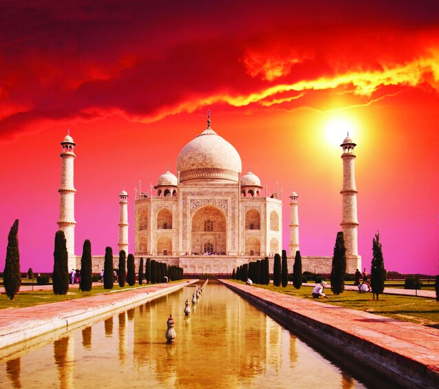 The Taj Mahal during a bright orange sunset
