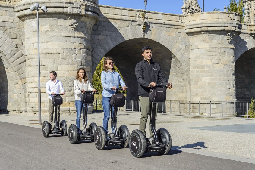 Show item 1 of 11. Day view of a group on a segway tour in Madrid, Spain
