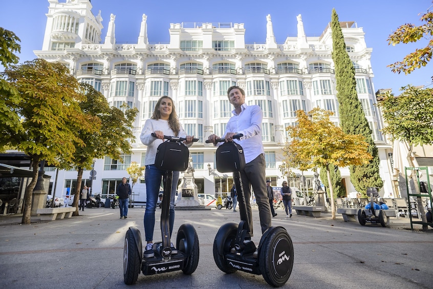 Show item 2 of 11. Couple enjoying a segway tour in Madrid, Spain