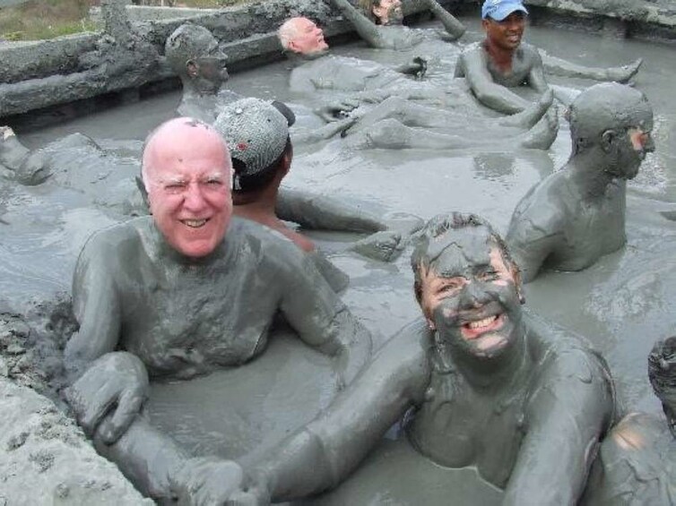 Group having a mud bath in Colombia