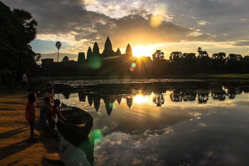 Reflections on Srah Srang Reservoir at sunset