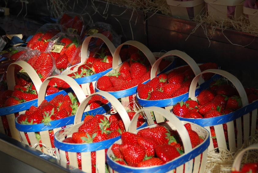 Freshly picked strawberry baskets in Sault at the provencal market 