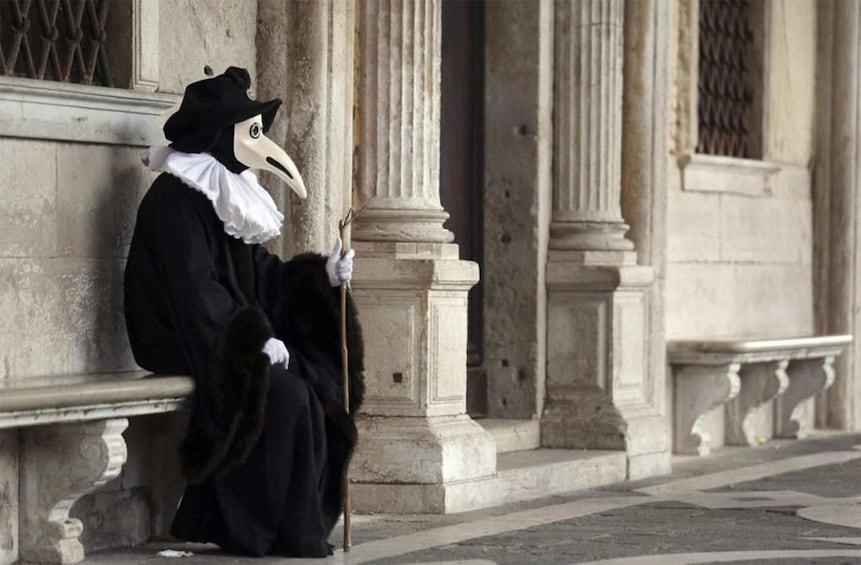 Person in costume in Venice