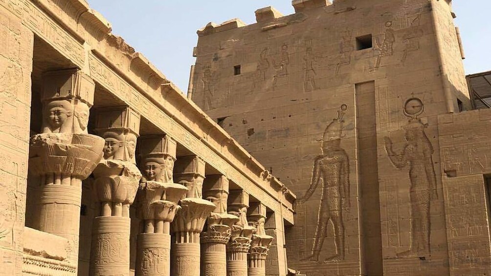 Columns and carved walls of Temple of Philae in Aswan, Egypt