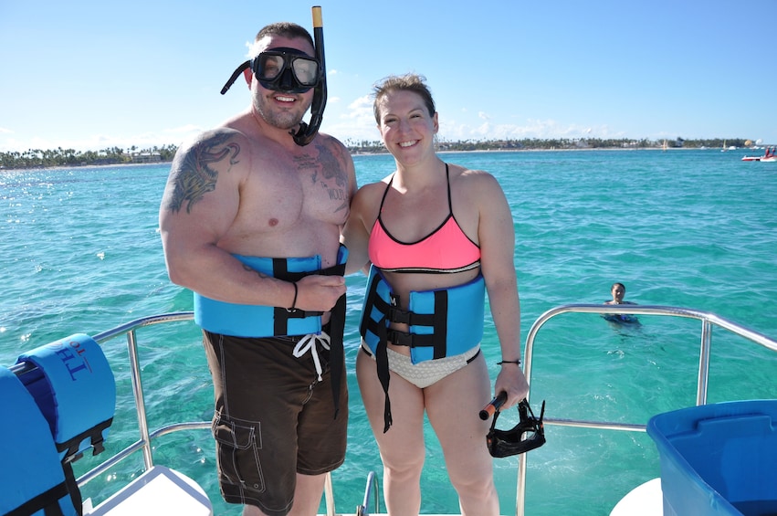 Couple pose with snorkel gear on boat in Punta Cana, Dominican Republic