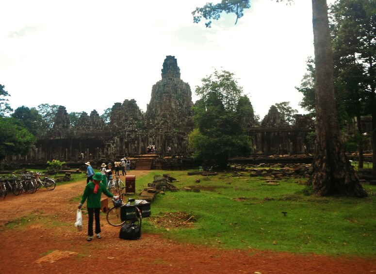 Tourists walk grunds of Angkor Thom in Siem Reap, Cambodia