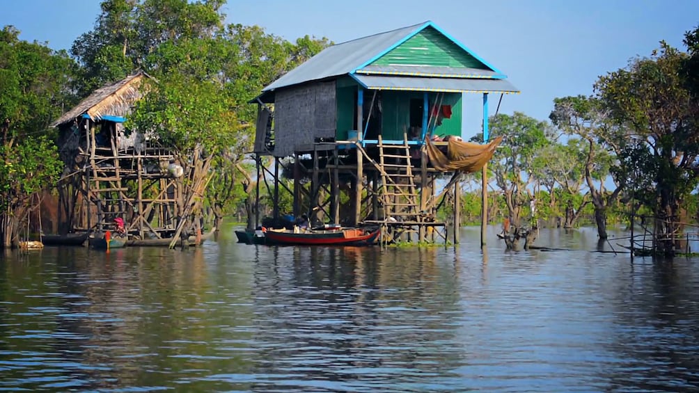 Cambodian houses standing on stilts over the water