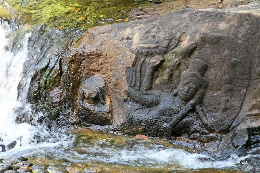 Carved rocks and waterfall at Kbal Spean in Angkor, Cambodia