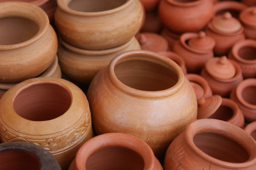 Closeup of many finished clay pots