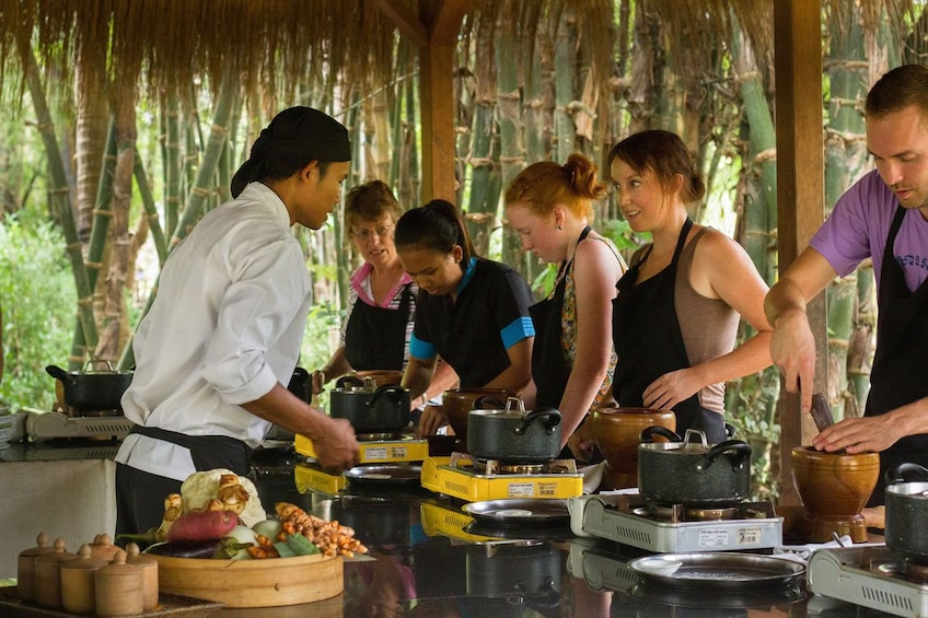 Chef instructs participants during Siem Reap cooking class