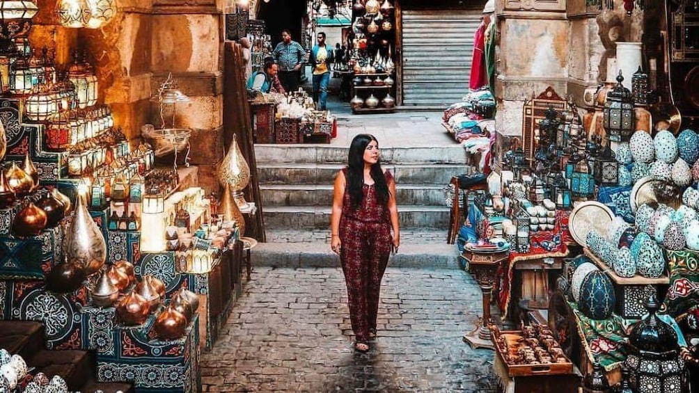 Woman walks through Khan el-Khalili Market in Cairo, Egypt