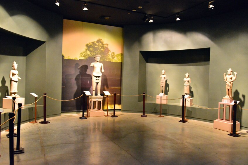 Small statue exhibit at Angkor National Museum