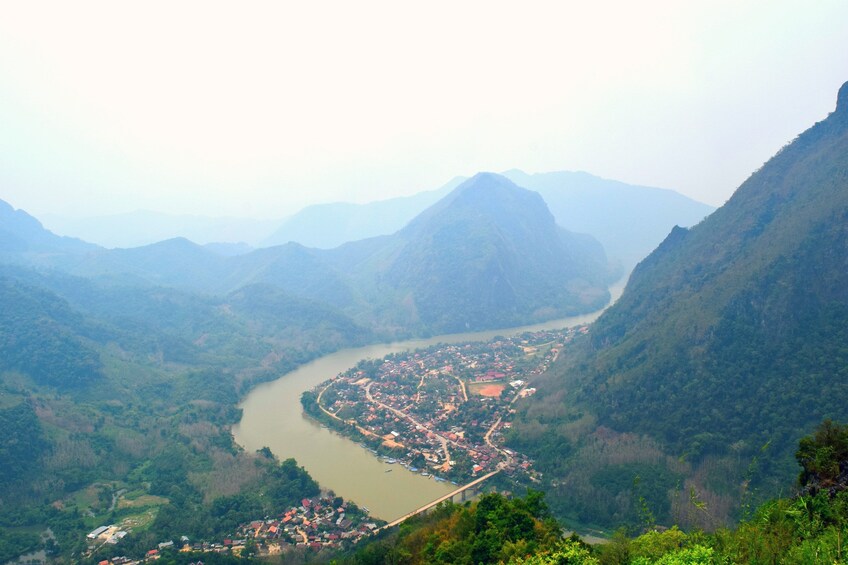 Aerial view Nong Khiaw Village on a foggy day