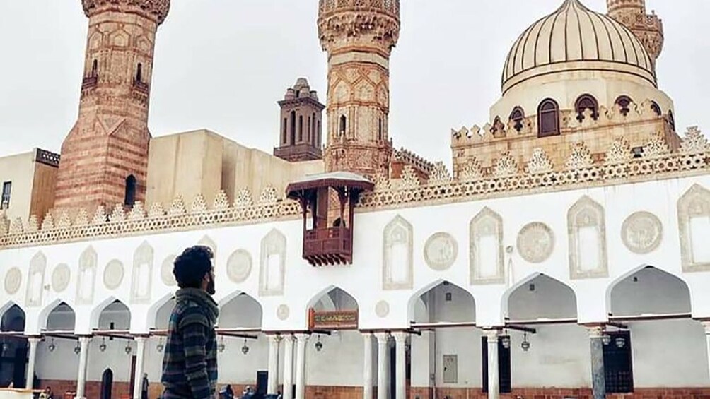Man in front of Al-Azhar Mosque in Cairo, Egypt