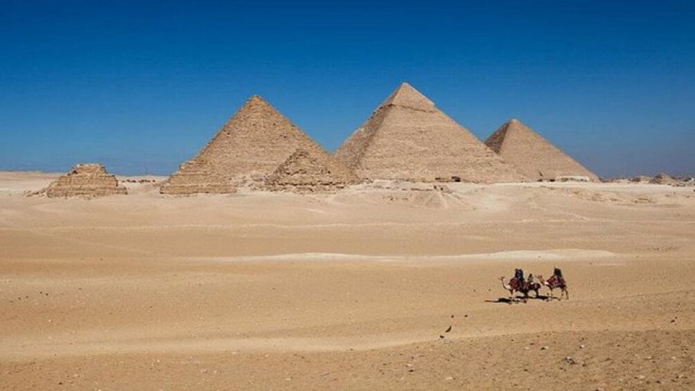 The Pyramids of Giza and surrounding desert on a clear day