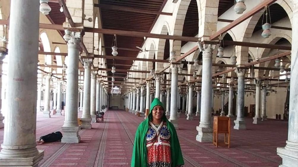 Woman poses inside Al-Azhar Mosque in Cairo, Egypt