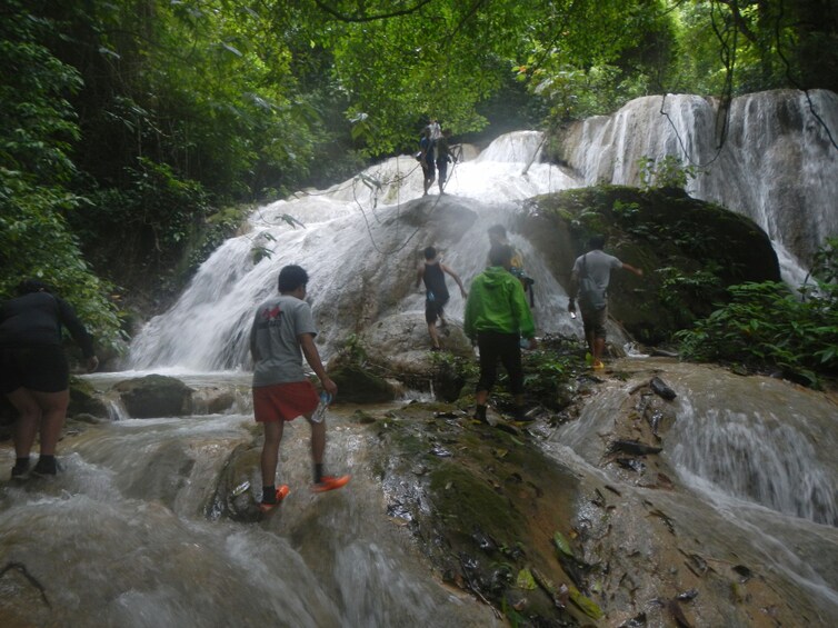 Tourists visiting the Tad Sae Waterfall 