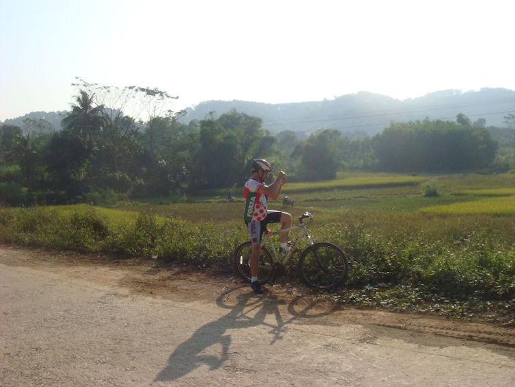 Man mountain biking in Luang Prabang