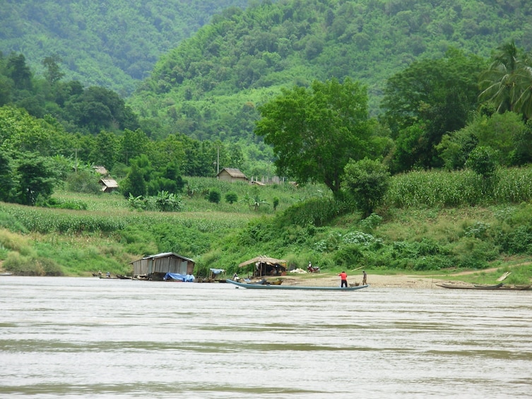 Locals on a boat in Luang Prabang