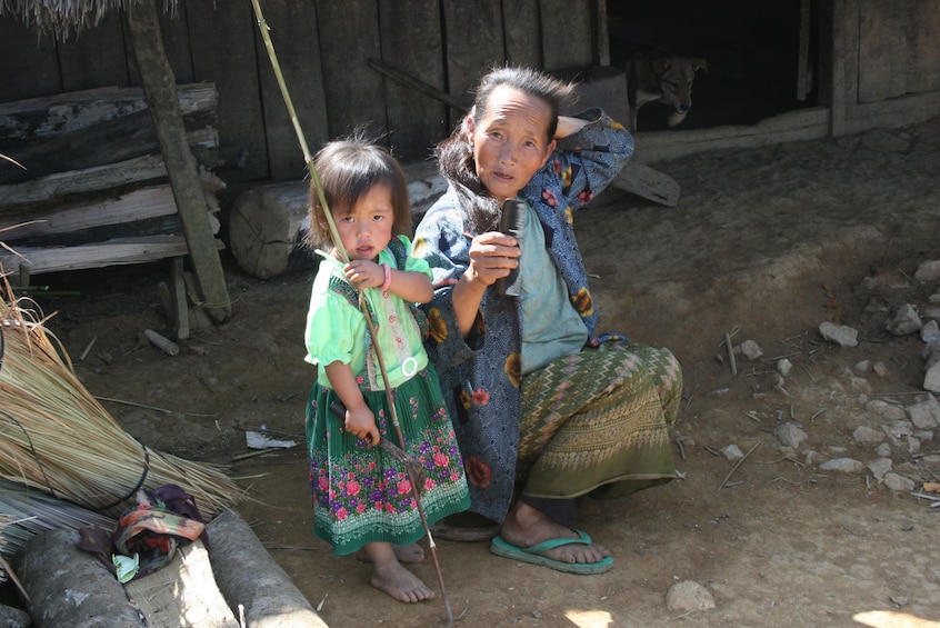 Woman and toddler in Khmu village in Laos