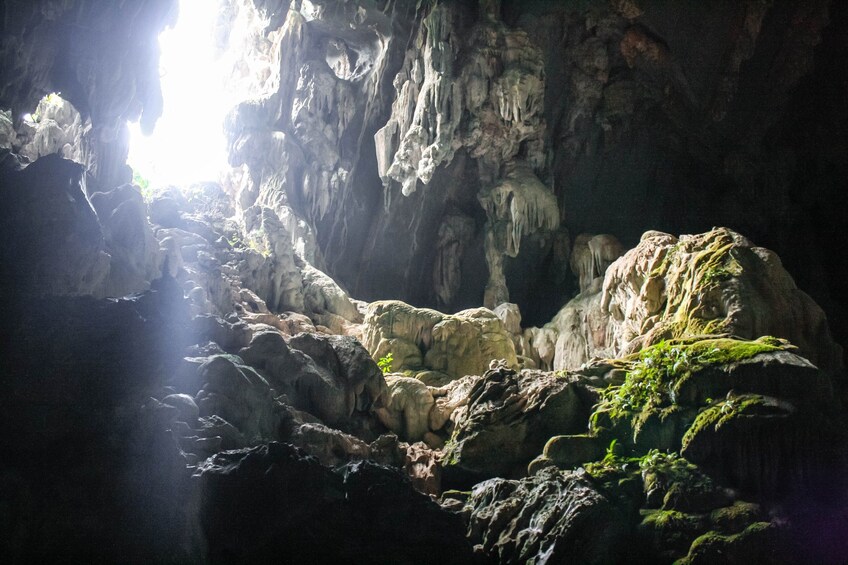 Light shining into a cave in Vang Vieng 