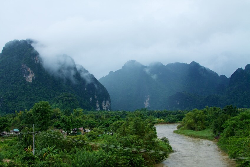 Misty day over river and mountains of Vang Vieng, Laos
