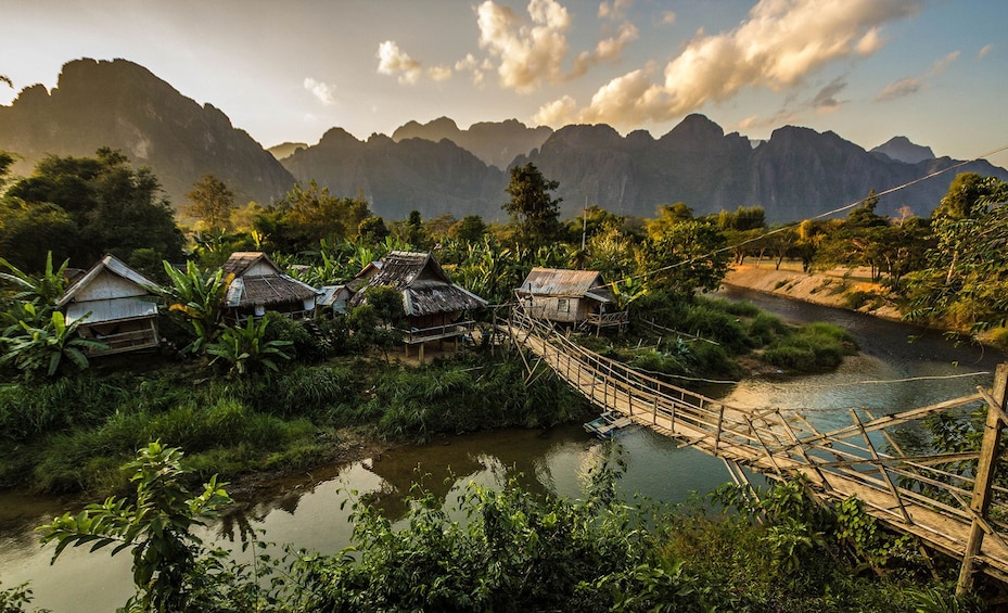 Nam Xong RIver, buildings and mountains in Vang Vieng, Laos