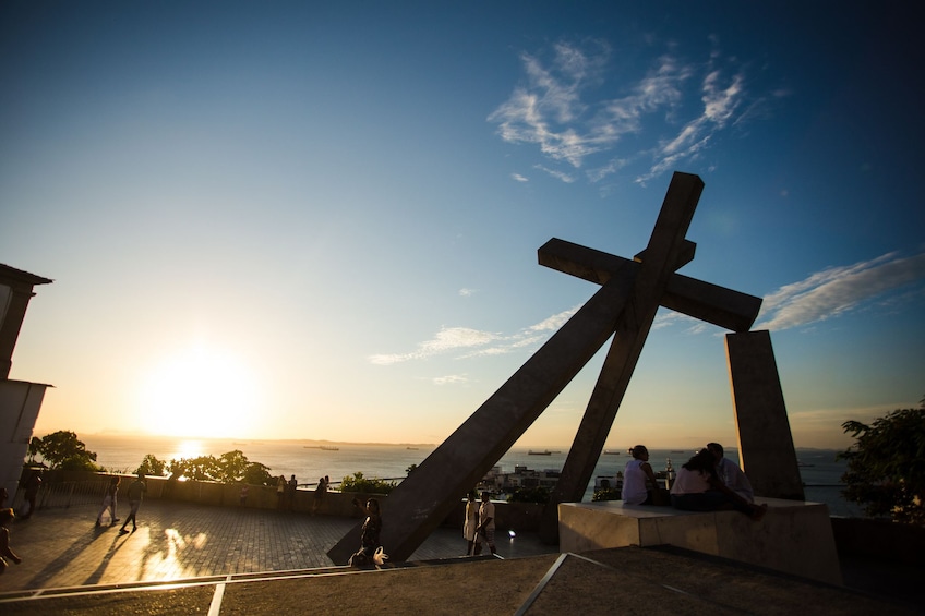 Fallen cross in Salvador, Brazil at sunset