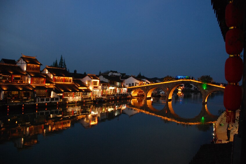 Zhujiajiao and bridge lit at night