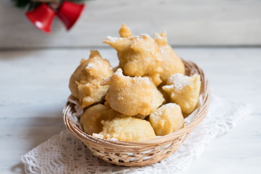 Basket of Zeppole with powdered sugar