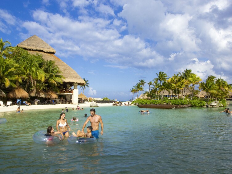 Family enjoying Xcaret Theme park in Mexico