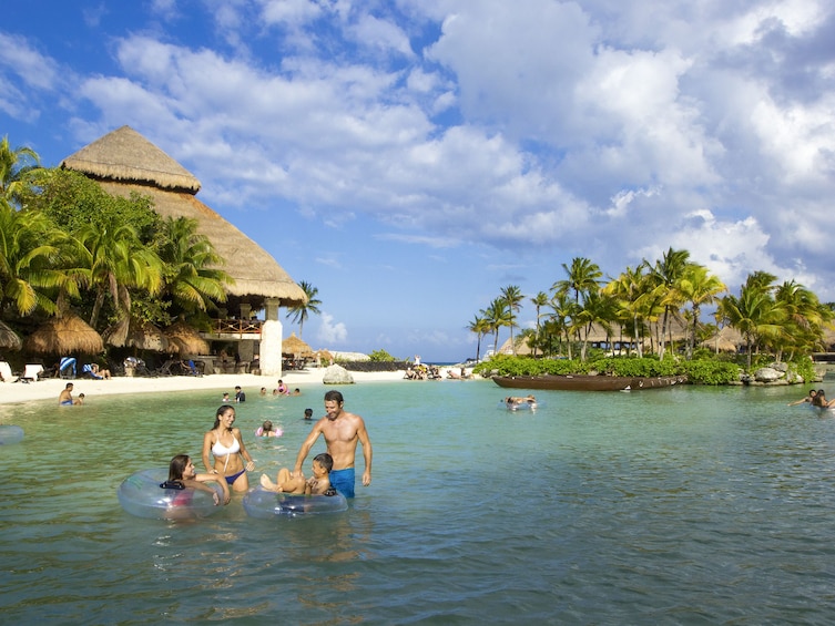 Family enjoying Xcaret Theme park in Mexico