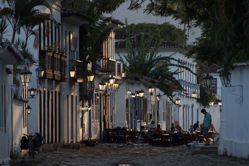 Street lined with buildings at dusk in Rio de Janeiro