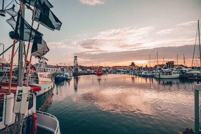 Show item 1 of 7. Sun sets over pier in Copenhagen, Denmark